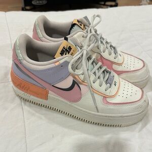 Nike Air Pastel Sneakers with Pink and Orange Accents